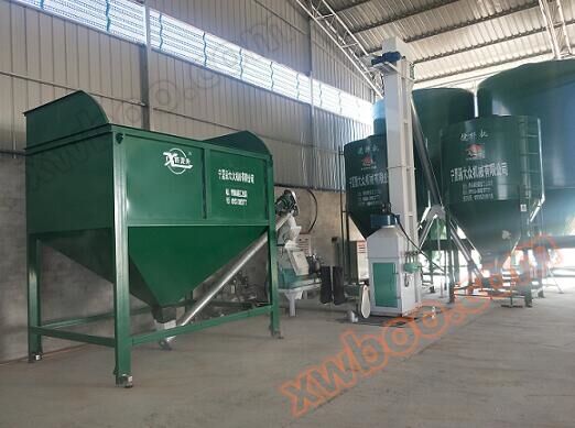 Vertical mixed feed unit